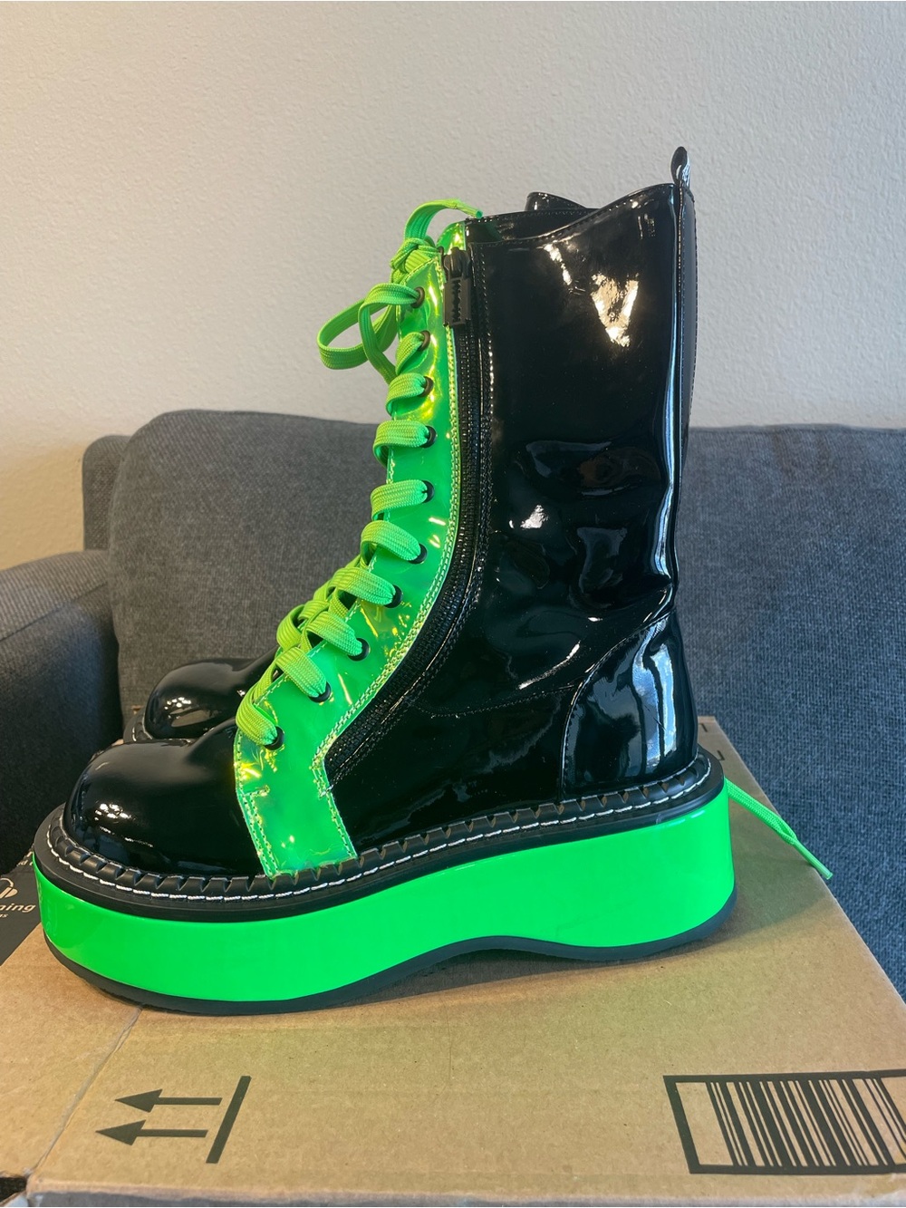 Demonia Women’s Black Lace-Up Platforms with Neon Green Accents